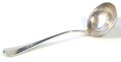 A George V silver rattail ladle