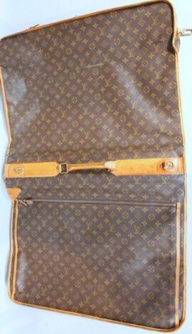 A modern Louis Vuitton Paris folding suit container