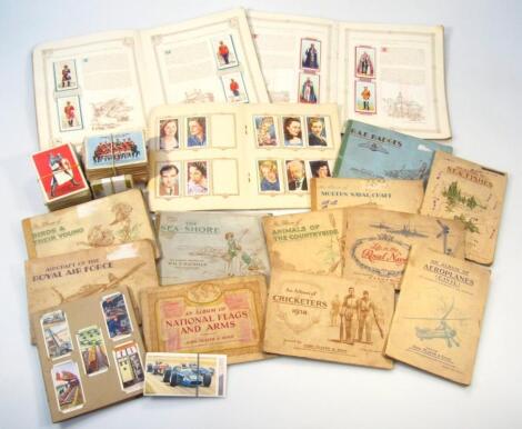 Various cigarette and trade cards