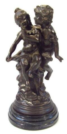 A 20thC bronze finish figure group