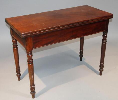 A 19thC mahogany fold-over table