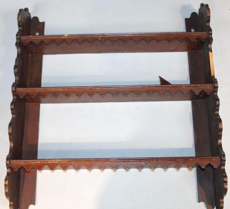 A set of 19thC mahogany hanging shelves