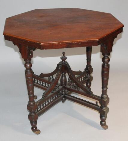 An Edwardian walnut stained occasional table