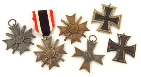 A quantity of various Nazi badges