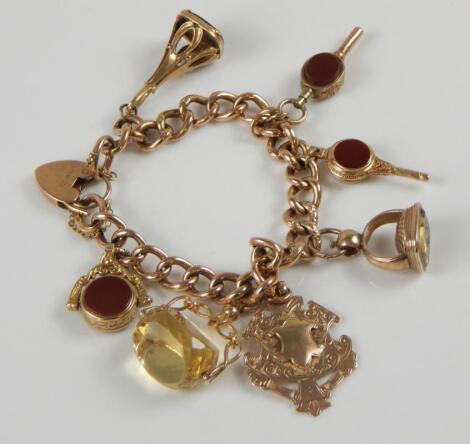 A 9ct gold charm bracelet