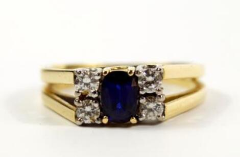 An 18ct gold sapphire and diamond ring