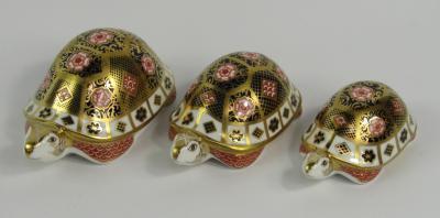 Three Royal Crown Derby Imari porcelain paperweights modelled as the Father