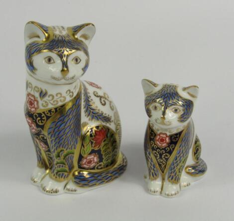 Two Royal Crown Derby Imari porcelain paperweights modelled as the Fireside Cat and Fireside Kitten