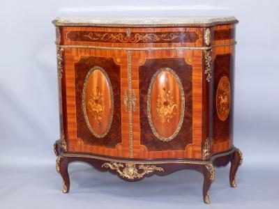 A French Kingwood walnut and inlaid serpentine commode