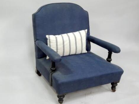 A Victorian ebonised low armchair