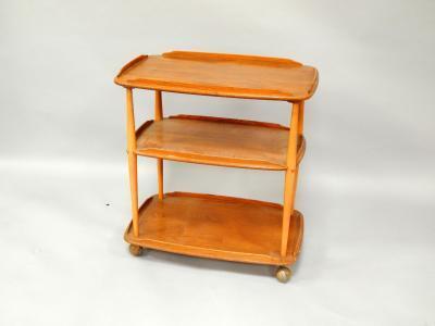 An oak three tier trolley