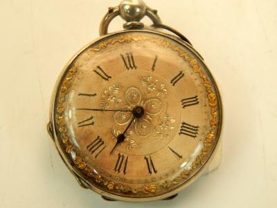 A lady's white metal cased pocket watch
