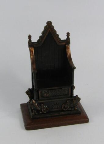 A Harper cast metal money box of the Coronation Throne