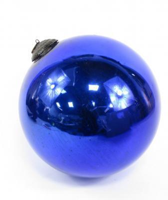 A blue glass witches ball