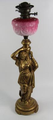 A Victorian gilt metal figural oil lamp