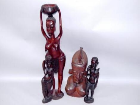 A group of African wooden carvings