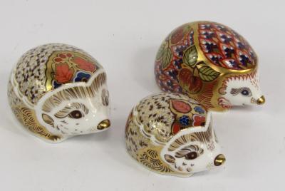 Three Royal Crown Derby Imari porcelain paperweights modelled as the Mother and Baby Hedgehog
