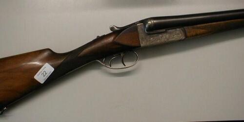 A Spanish 12-bore double-barrelled side-by-side shotgun