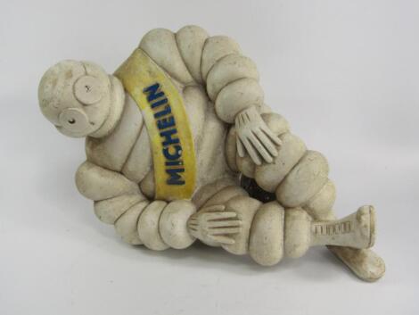 A large composite figure of a Michelin Man