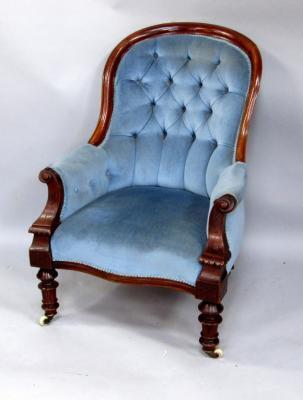 A Victorian mahogany showframe armchair