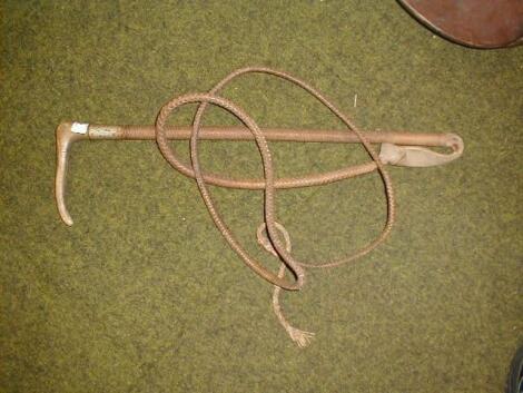 An horn handled whip, inscribed RAC