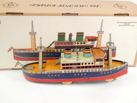 A Jaya tin plate steam boat style clockwork toy.