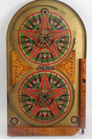 A Lindstrom's Gold Star tin plate bagatelle game