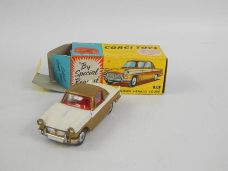 A Corgi Toys diecast vehicle Triumph Herald Coupe