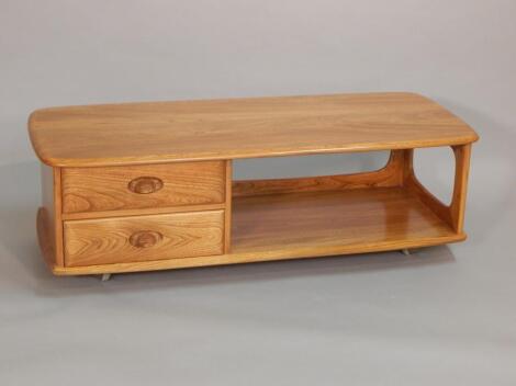 An Ercol light elm retro coffee table