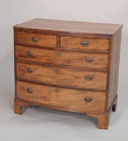 An early 19thC mahogany bow fronted chest of drawers