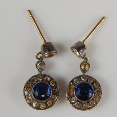 A pair of costume earrings