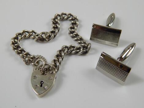 A modern silver charm bracelet