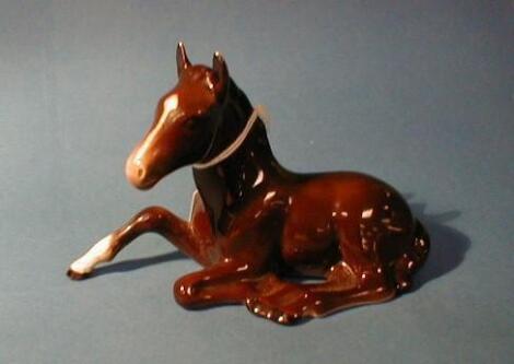 A Beswick figure, foal (lying), # 915, brown gloss