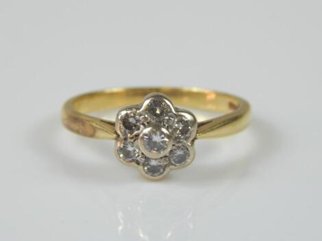 An 18ct gold diamond floral cluster ring