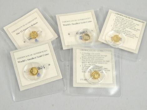 Five gold coins from the World's Smallest Gold Coin Series