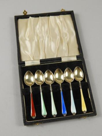 A Harlequin set of six silver gilt coffee spoons