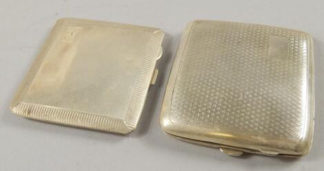 Two engine turned silver cigarette cases