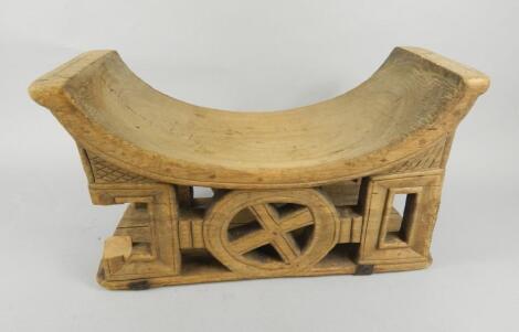 Tribal Art. An African headrest with pierced base