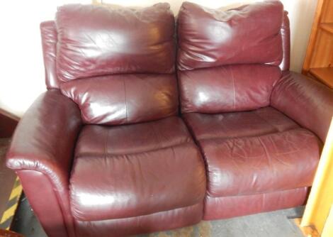 A modern Lazyboy brown leather reclining two seat sofa.