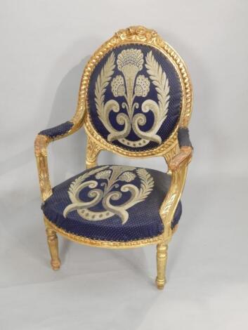 A Continental gilt open armchair