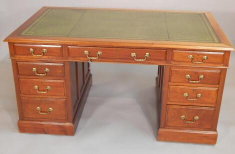 A 20thC mahogany pedestal desk