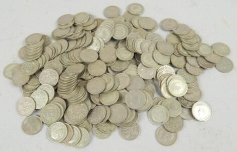 A large quantity of silver and nickel silver sixpences.