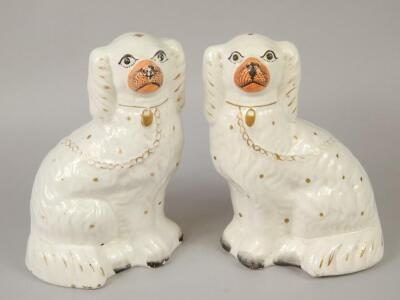 A pair of 19thC Staffordshire spaniels