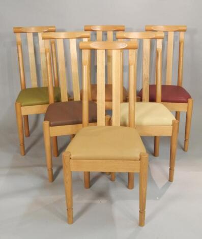 A harlequin set of six modern oak dining chairs