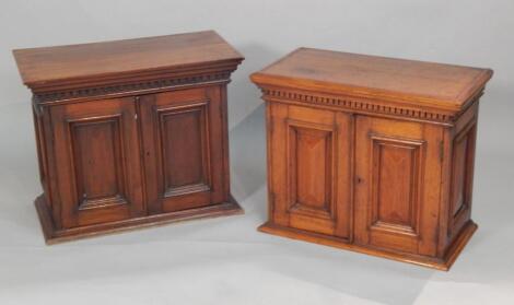 A near pair of Victorian walnut low side cabinets