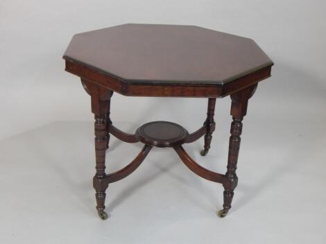 An Edwardian mahogany window table