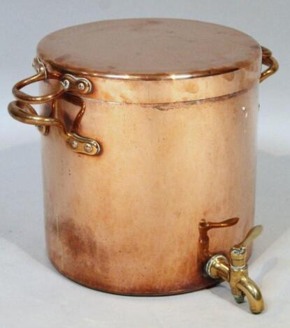 An early 20thC copper and brass water heater or samovar