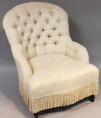 A late 19thC button back nursing chair