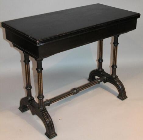 A 19thC Aesthetic style ebonised fold over games table