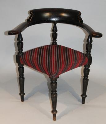 A late 19thC stained ash and elm corner chair